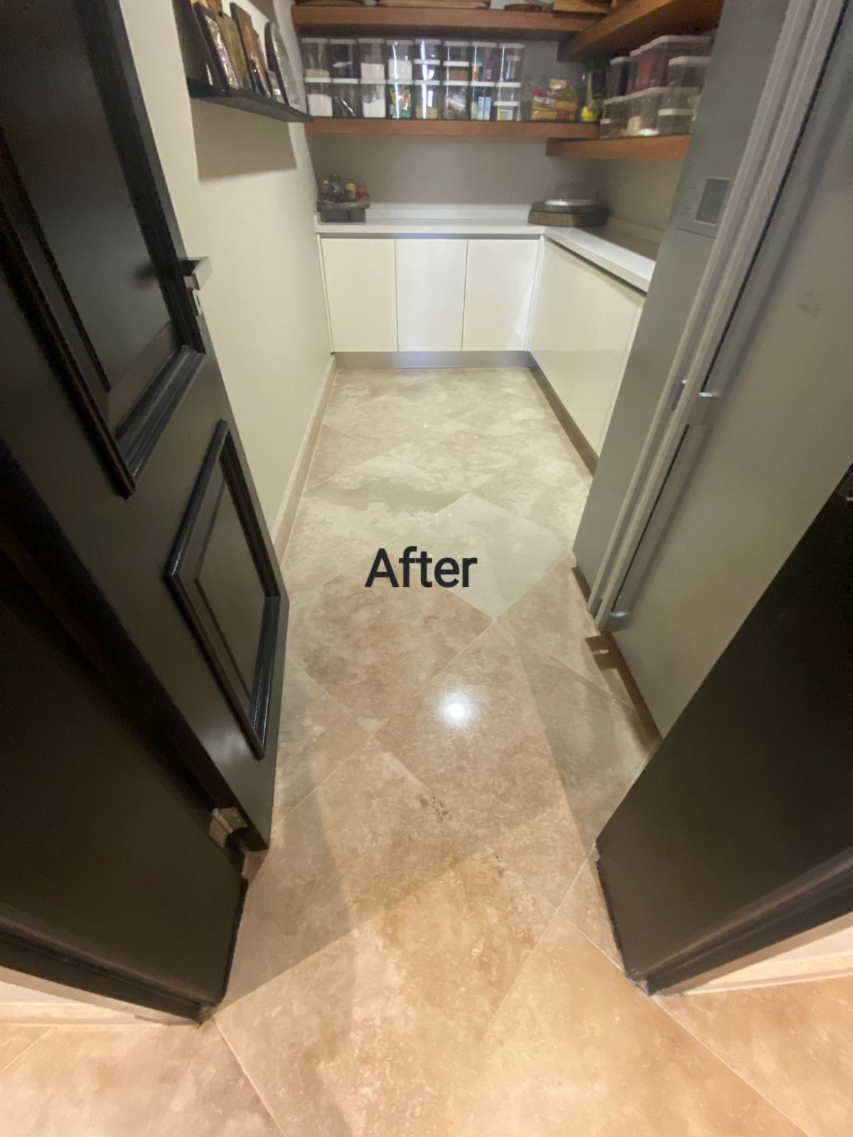 Clean polished stone floor detail in a bathroom